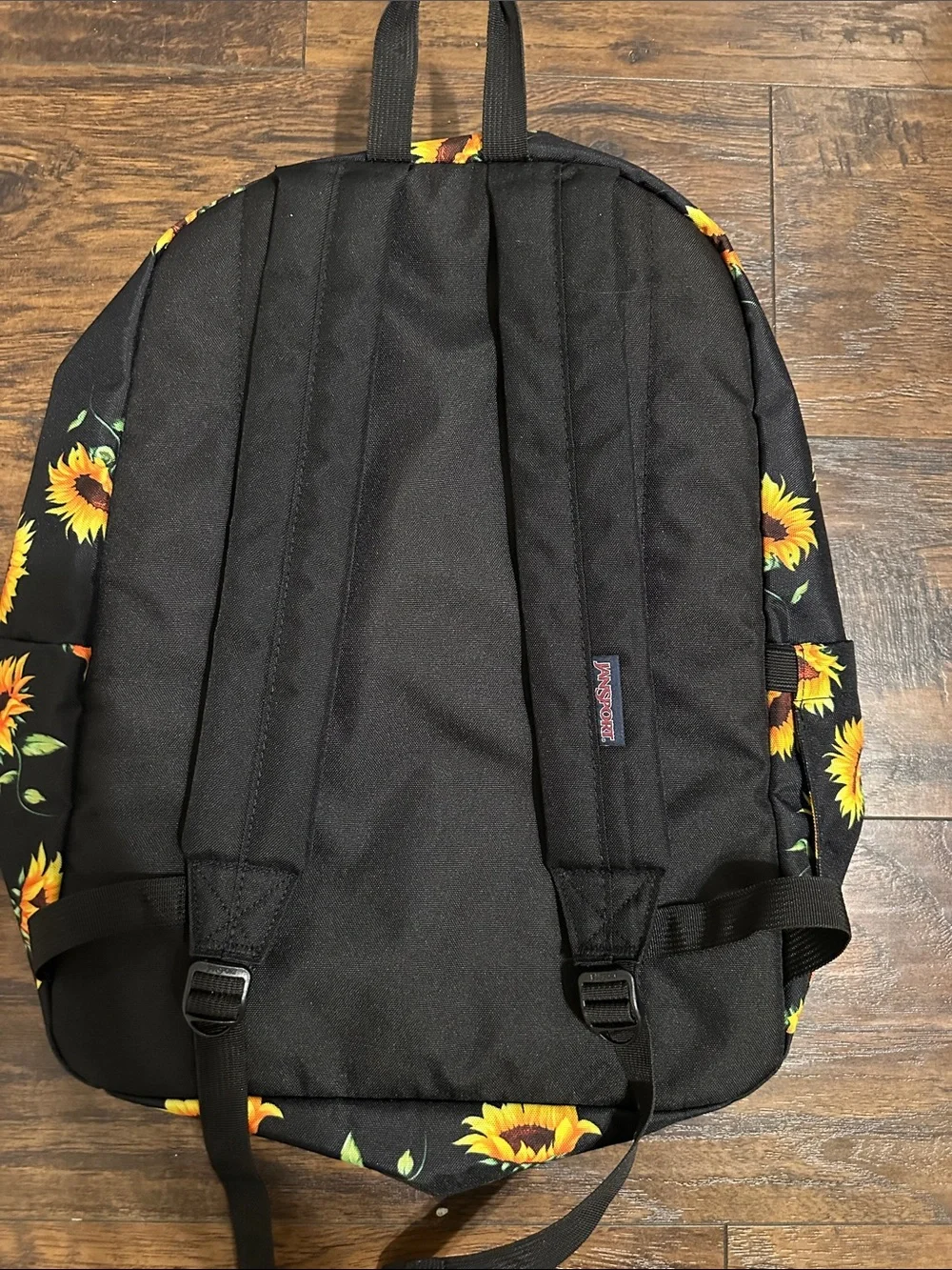 Jansport Black Backpack with Yellow Sunflower Print